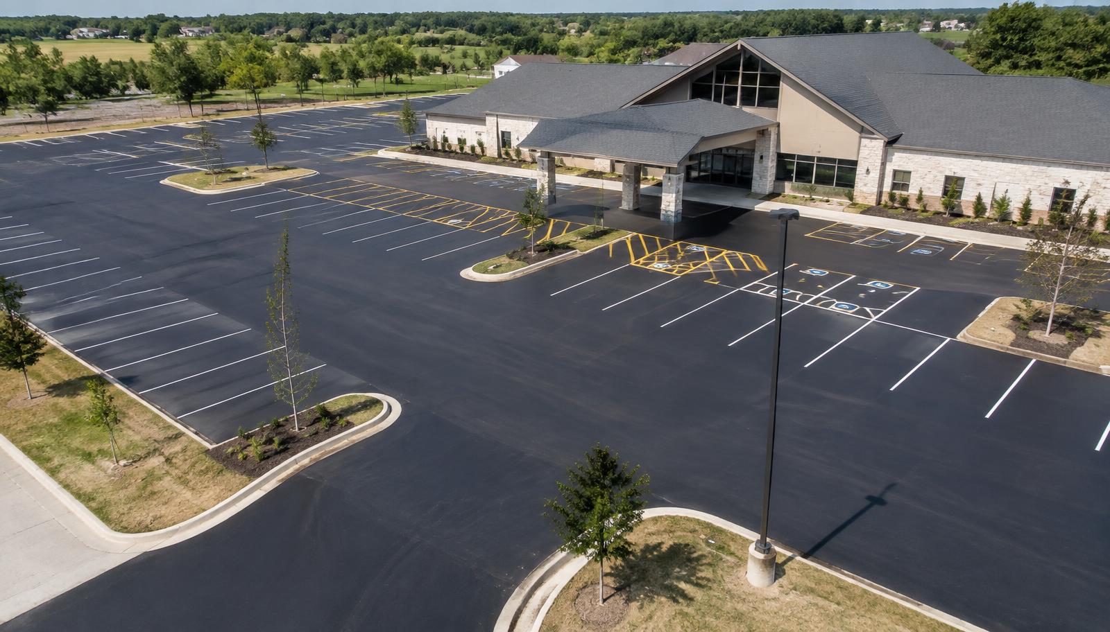Aerial view of a freshly finished commercial parking lot